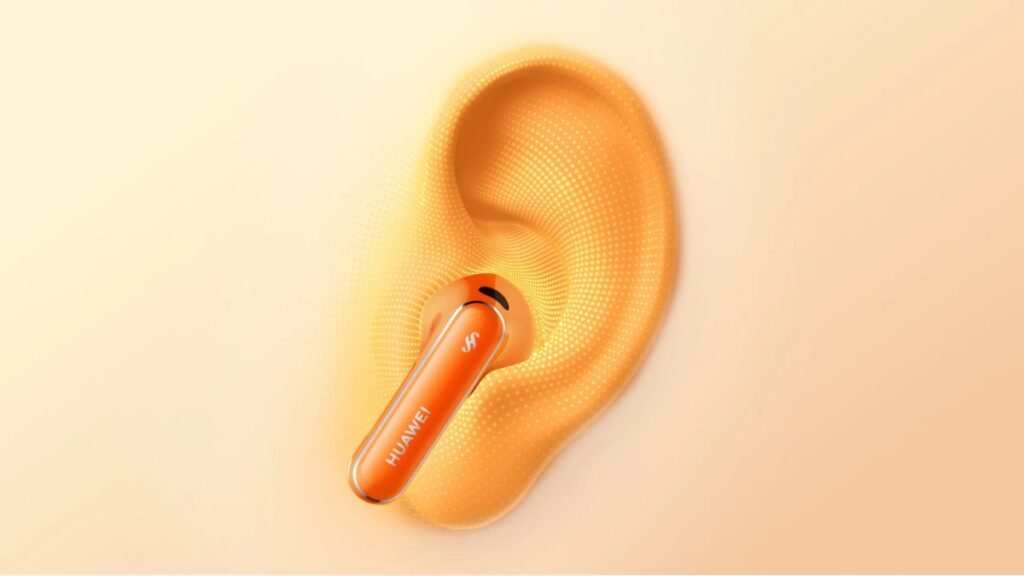 The Huawei FreeBuds 7 semi-in-ear wireless earbuds resting beside their pebble-shaped charging case in Sunlight Orange.