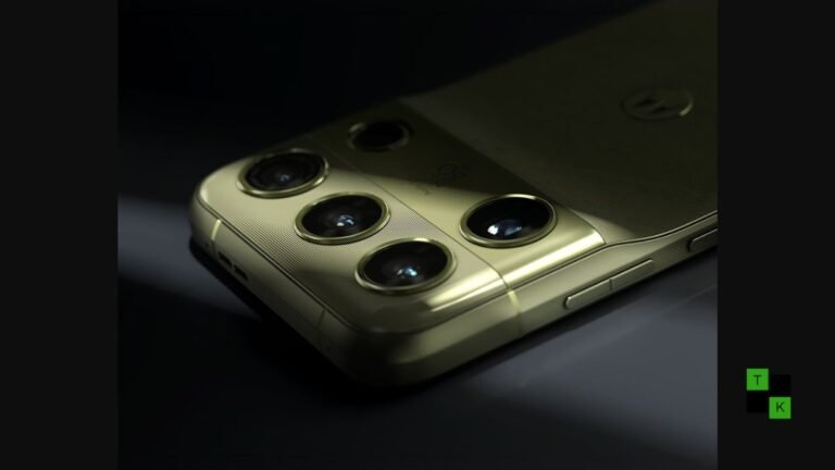 The Motorola Signature 27 smartphone featuring a textured Pantone Capulet Olive vegan leather back and brushed gold camera trim.