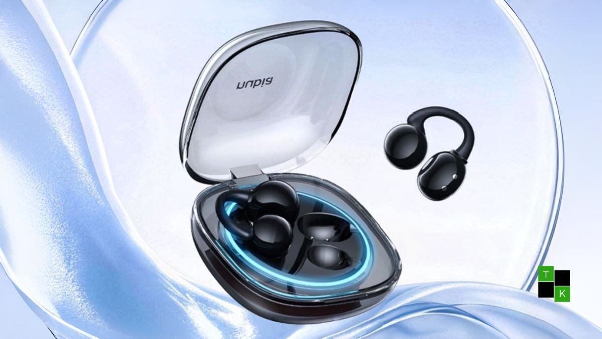 The Nubia LiveClip 2 open-ear clip-on earbuds resting inside an open smoked transparent charging case glowing with cyan RGB light.