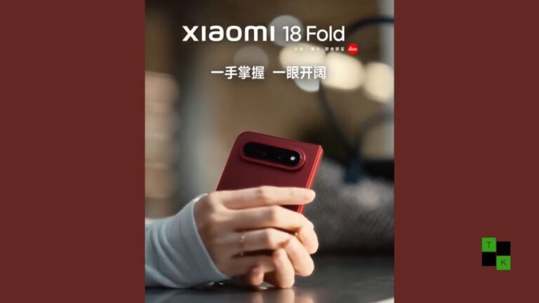 The Xiaomi 18 Fold in deep Cabernet Red resting half-unfolded on a dark architectural surface showcasing its horizontal Leica camera bar.