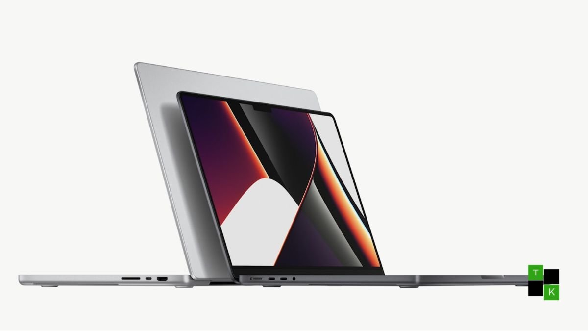 Apple 14-inch Touchscreen MacBook Pro in Space Black showing OLED display, Dynamic Island, and finger tapping an editing timeline.