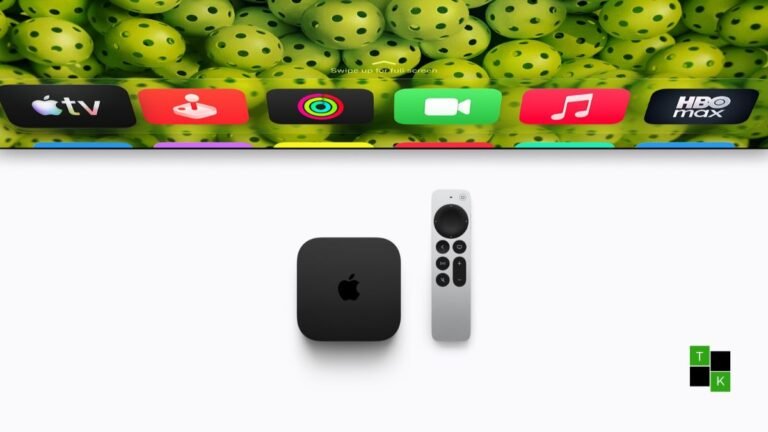 The new Apple TV 4K 4th generation box and silver Siri Remote resting on an architectural media console in front of a 4K television.