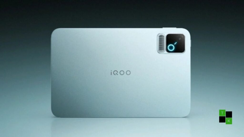 The iQOO Pad Pro 8.8-inch gaming tablet in sleek metallic gray held in landscape mode, showcasing its slim bezels, 298g chassis, and vibrant gameplay.