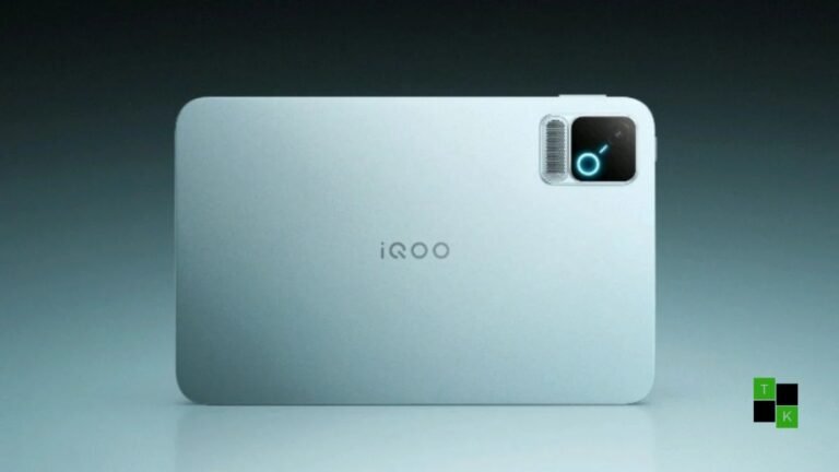 The iQOO Pad Pro 8.8-inch gaming tablet in sleek metallic gray held in landscape mode, showcasing its slim bezels, 298g chassis, and vibrant gameplay.