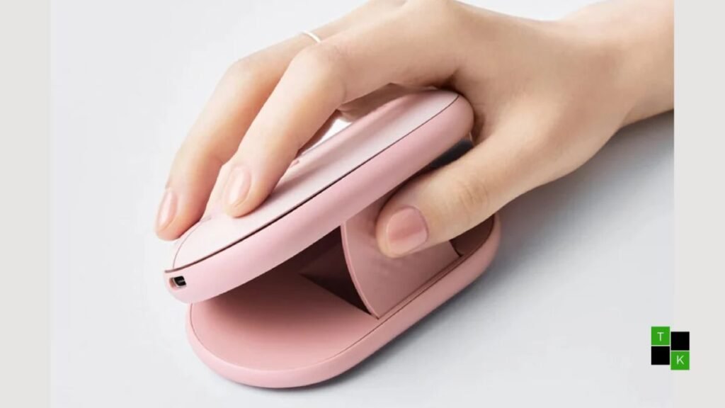 Logitech Pebble Up dual-form mouse in Tonal Rose finish shown in raised 35-degree ergonomic comfort mode next to a compact laptop.