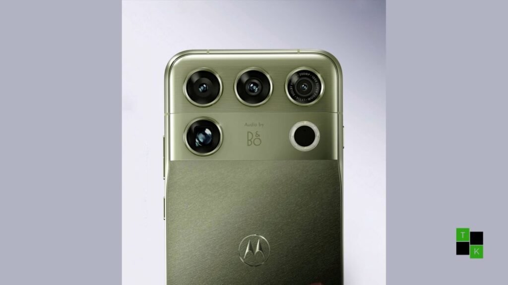 Motorola Signature 27 smartphone in Pantone Capulet Olive finish displaying flat 6.8-inch 165Hz screen and circular 200MP periscope camera module.