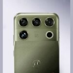 Motorola Signature 27 smartphone in Pantone Capulet Olive finish displaying flat 6.8-inch 165Hz screen and circular 200MP periscope camera module.