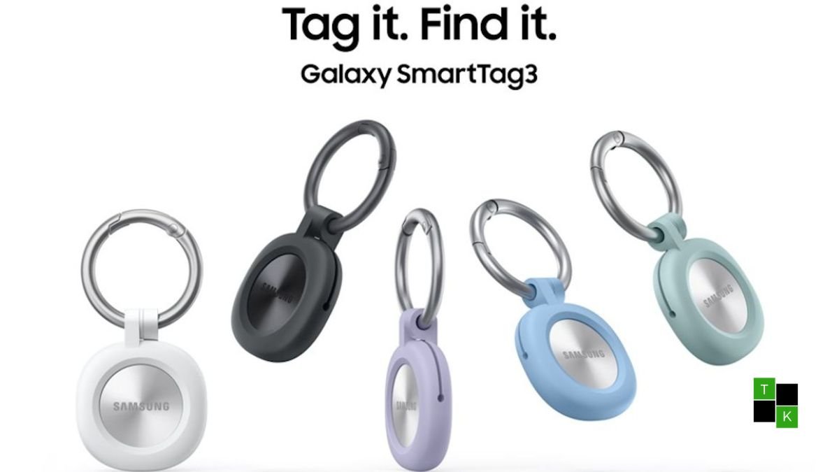 Samsung Galaxy SmartTag 3 circular personal tracker resting in a white silicone loop case on an architectural desk.