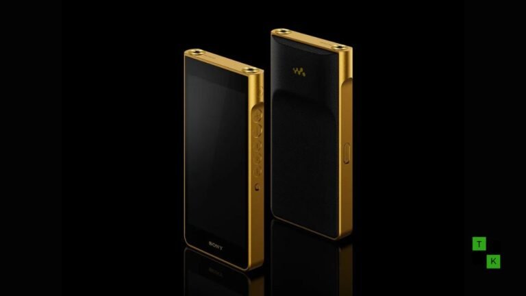 The gold-plated Sony Signature Series NW-WM1ZM3 Walkman resting on an audio engineering desk next to high-end planar magnetic headphones.