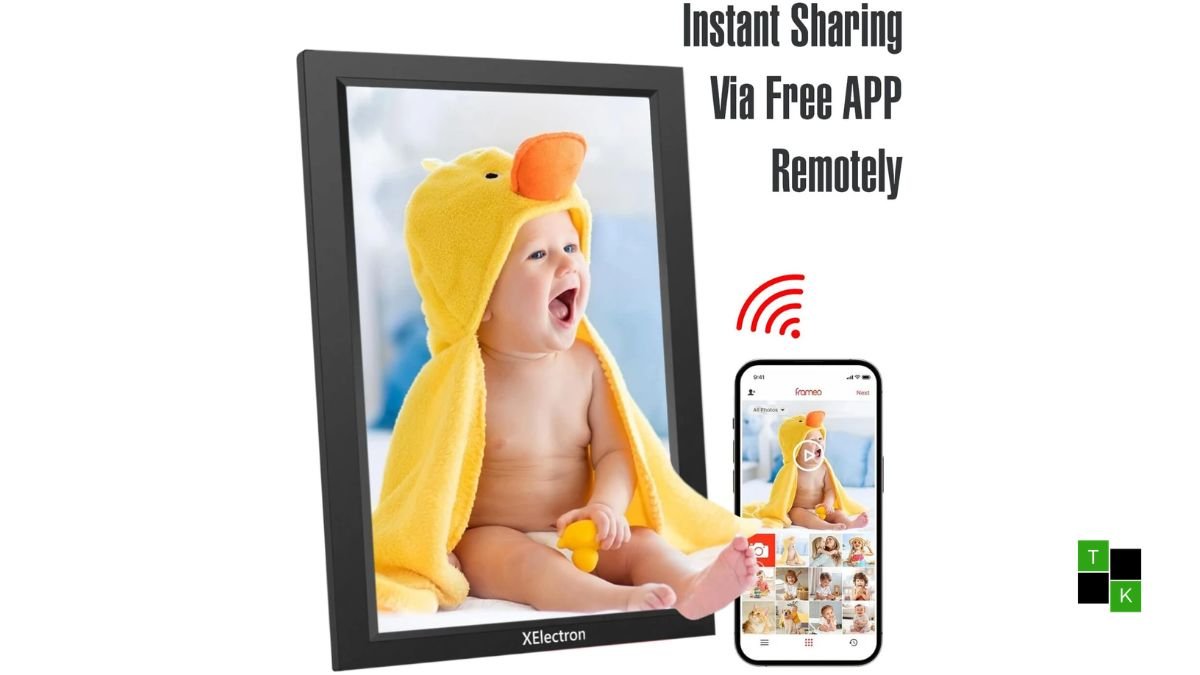 XElectron 15.6-inch Large Digital Photo Frame with wooden bezels displaying a family vacation photo on a wooden table.
