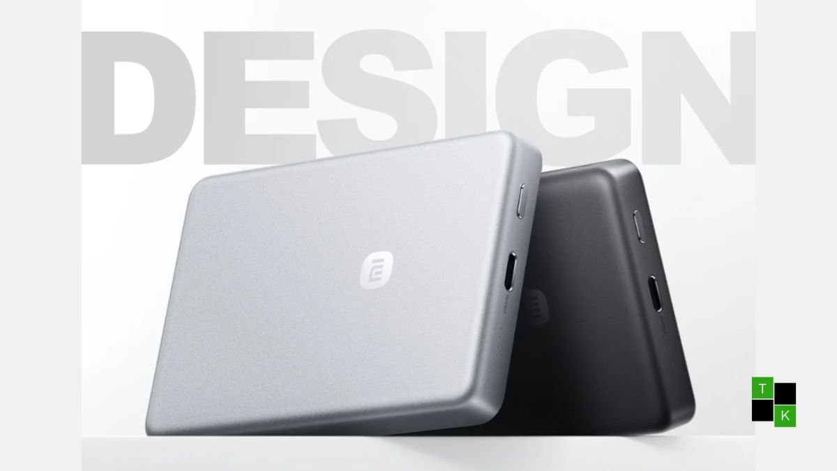 Xiaomi 10,000mAh 45W Ultra-Thin Magnetic Power Bank WPB1026S snapped onto the back of a modern smartphone on a sleek studio surface.
